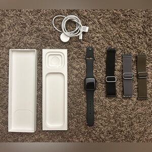 Almost New Apple Watch SE +Charger and 3 extra bands